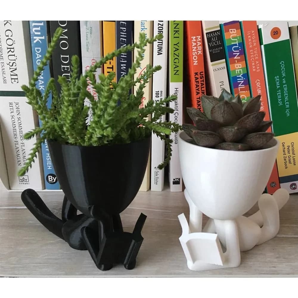STL - Maceta de libro con figura humana