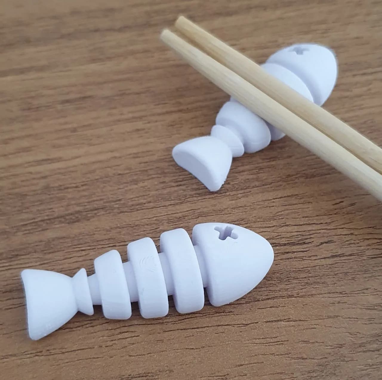 STL - Soporte para palillos con forma de pez render 1